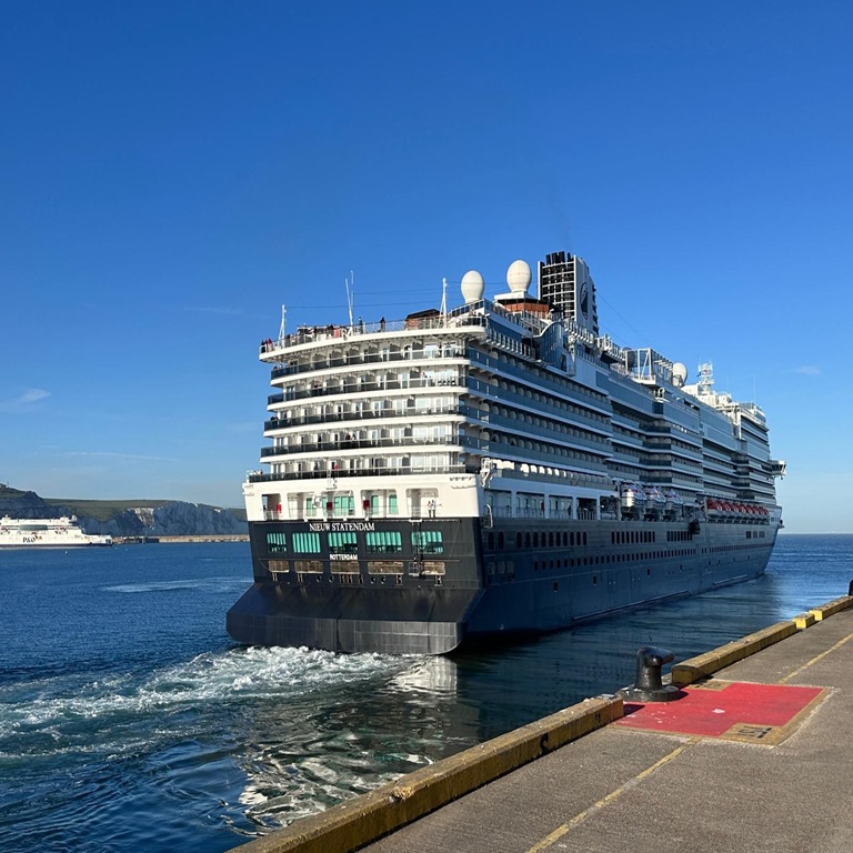 Cruise ship against blue sky leaving Dover Port